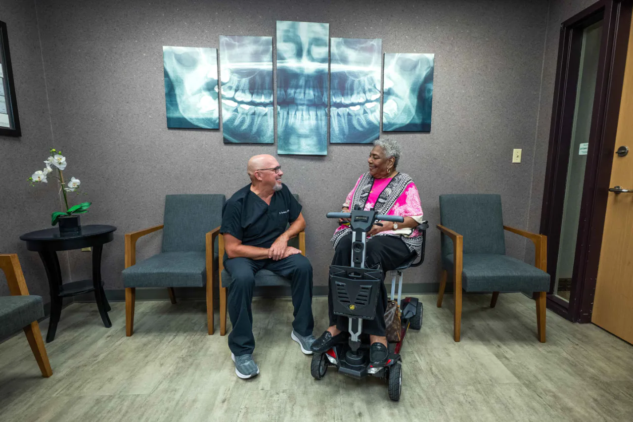 Dr. Trotter with a patient in the Hampton Oral & Facial Surgery waiting room